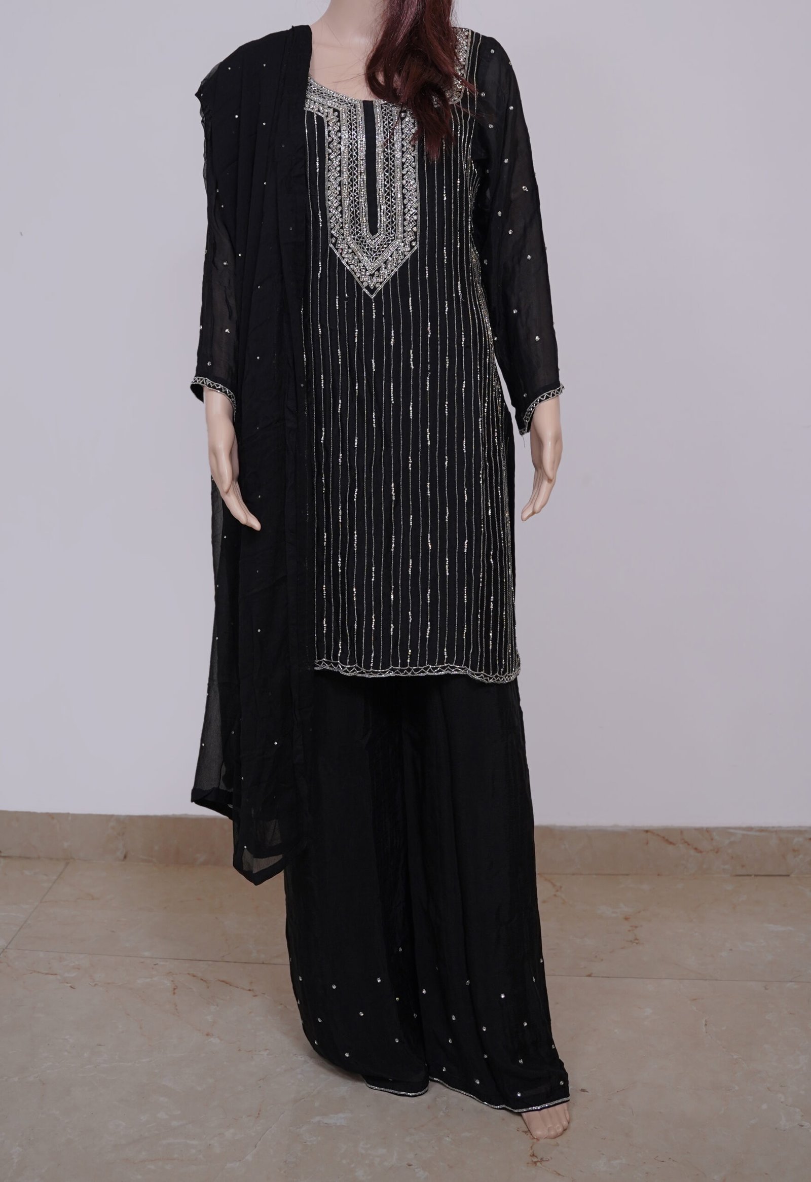 Black dress with cutdana embroidery